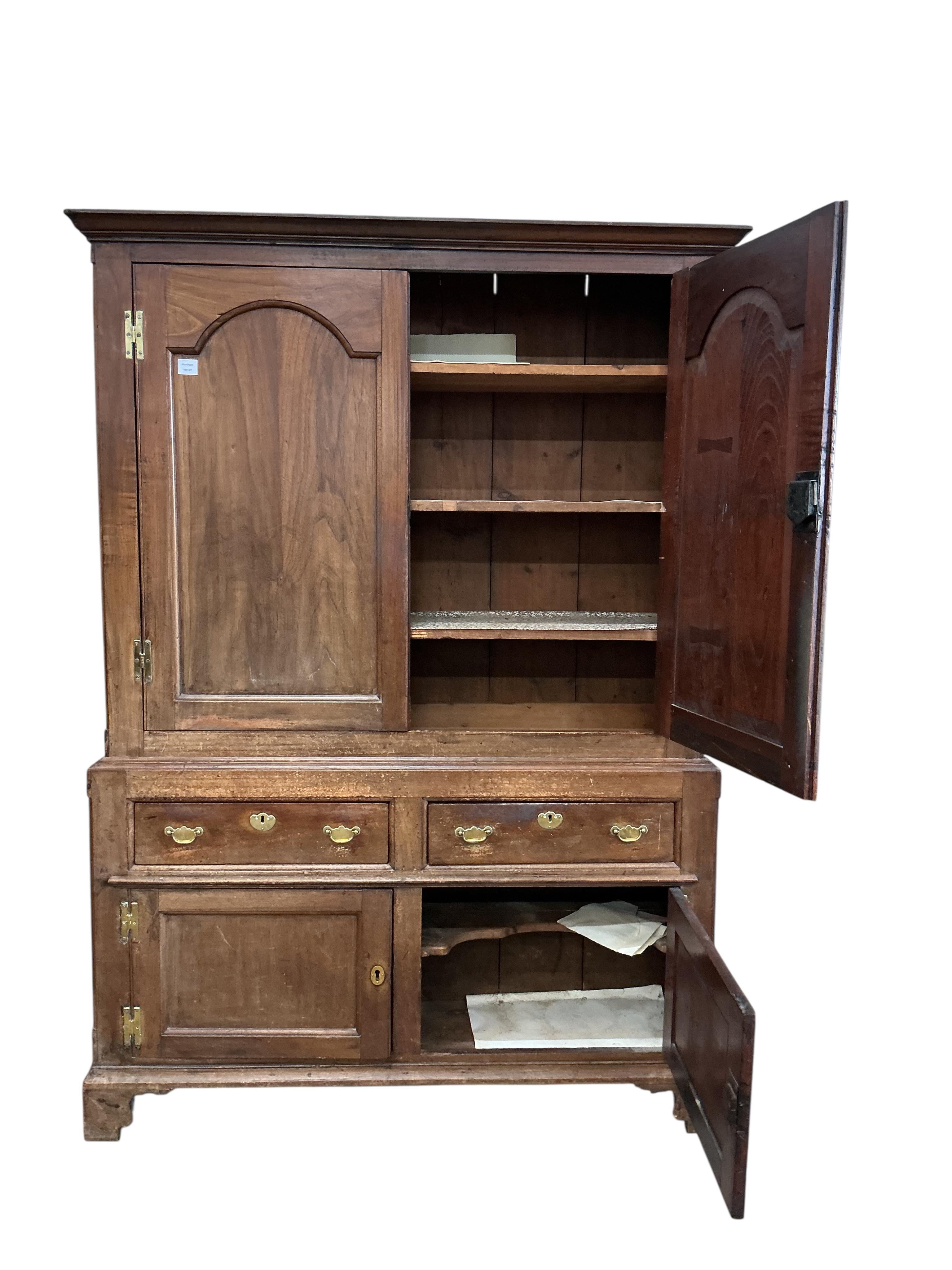 A George III fruitwood press cupboard, width 144cm, depth 41cm, height 204cm